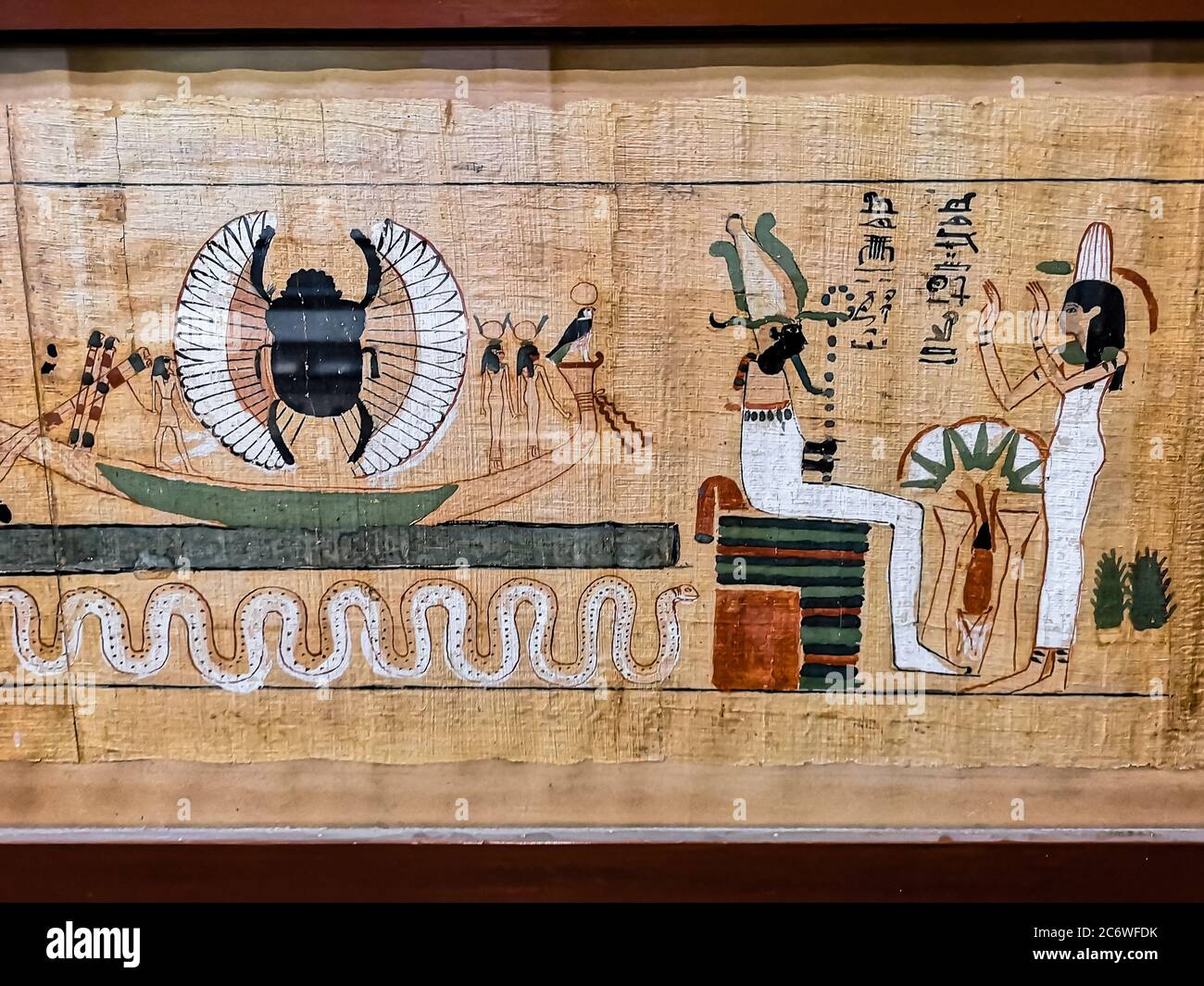 Antico papiro egiziano, immagine di dèi sul papiro. Foto Stock