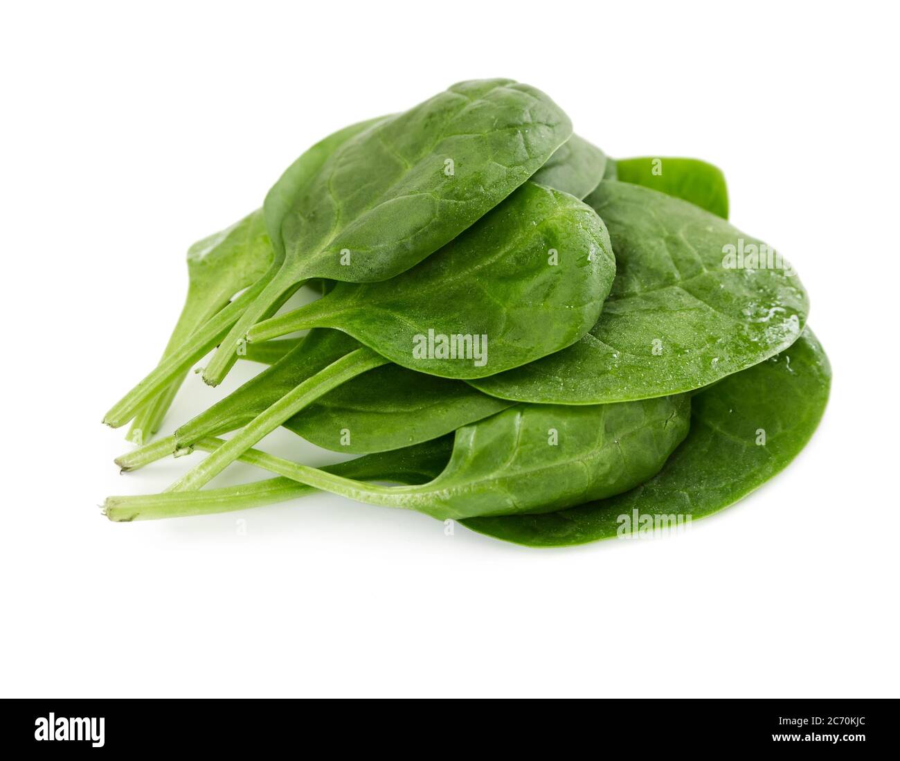Foglie di spinaci freschi isolate su sfondo bianco Foto Stock