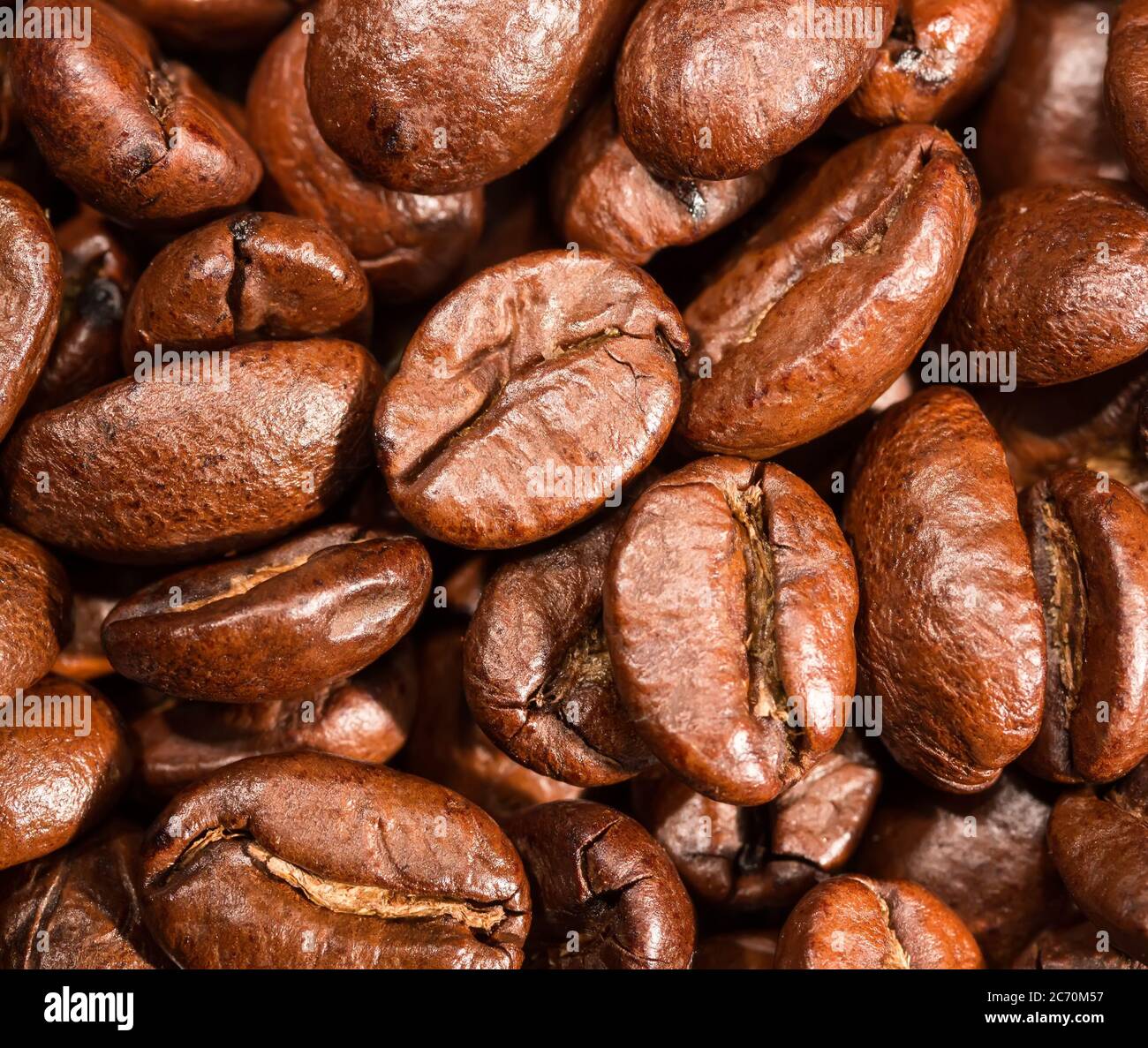 Sfondo di chicchi di caffè come consistenza, primo piano. Foto Stock