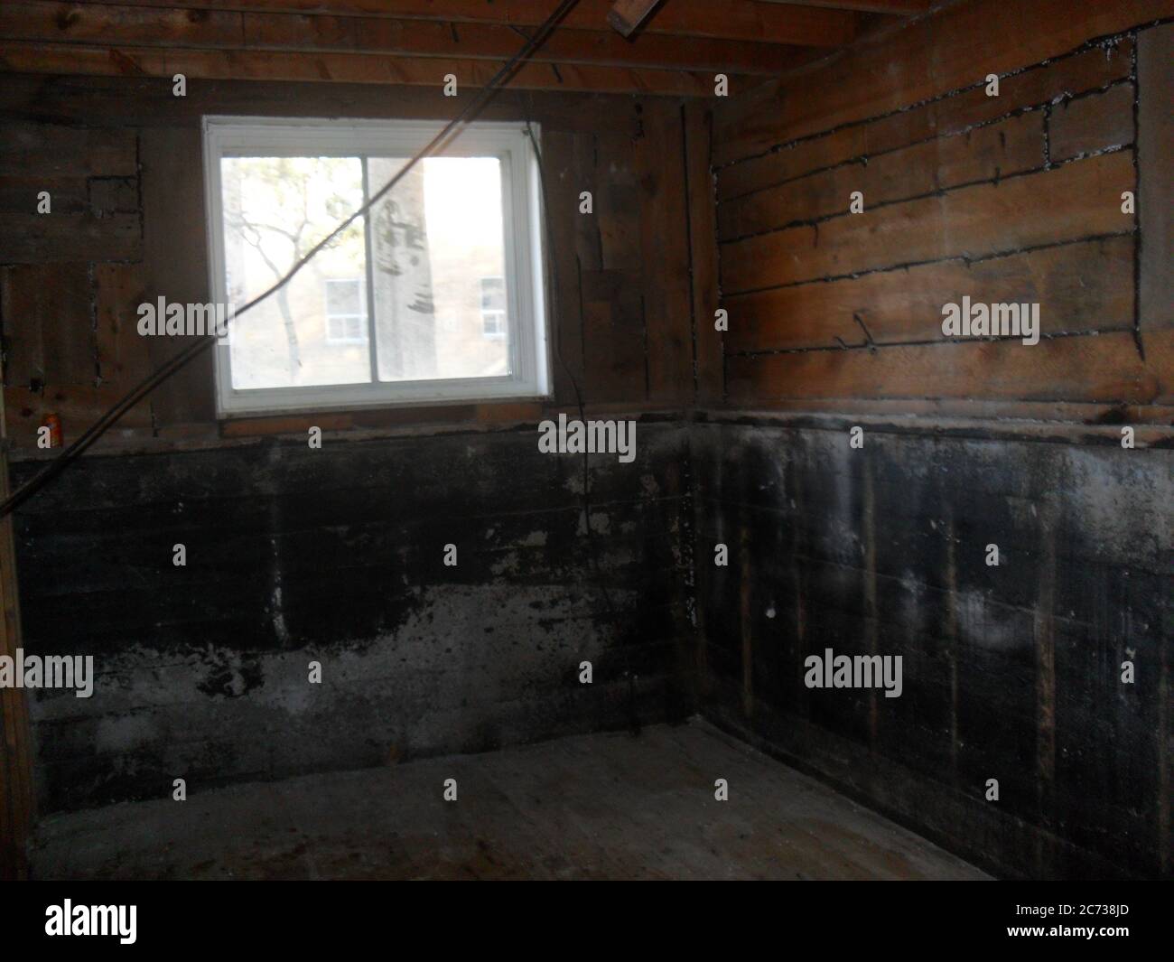 costruzione e ristrutturazione vecchia casa parzialmente bruciato in necessità di ristrutturazione Foto Stock