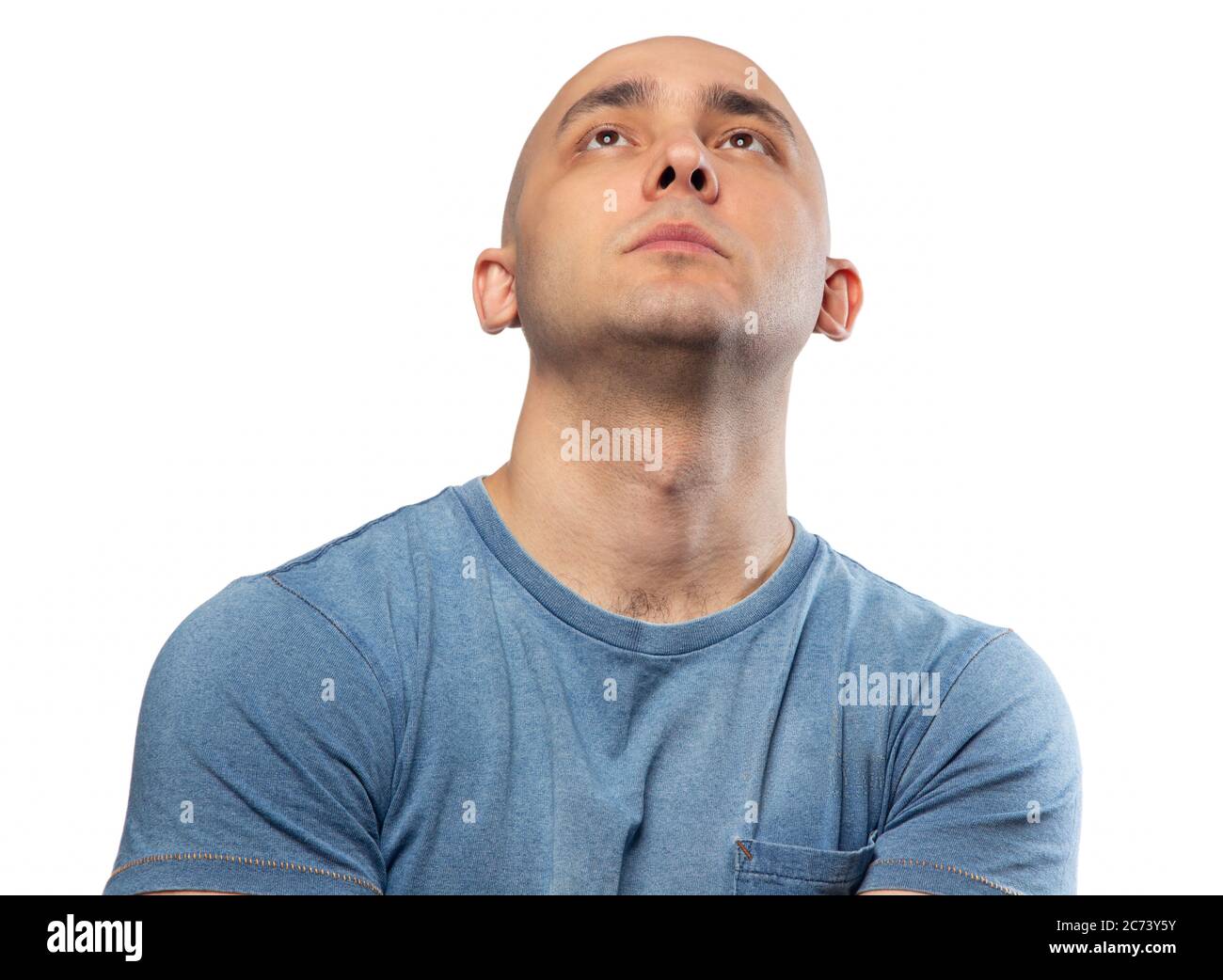 Foto di un uomo calvo perplesso in una maglietta Foto Stock