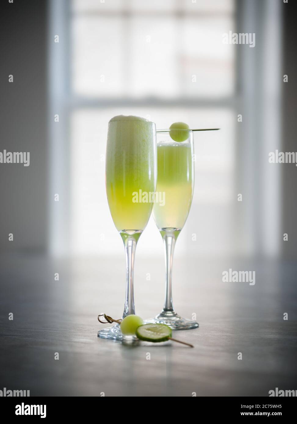 Cocktail di tequila con melone di miele Foto Stock