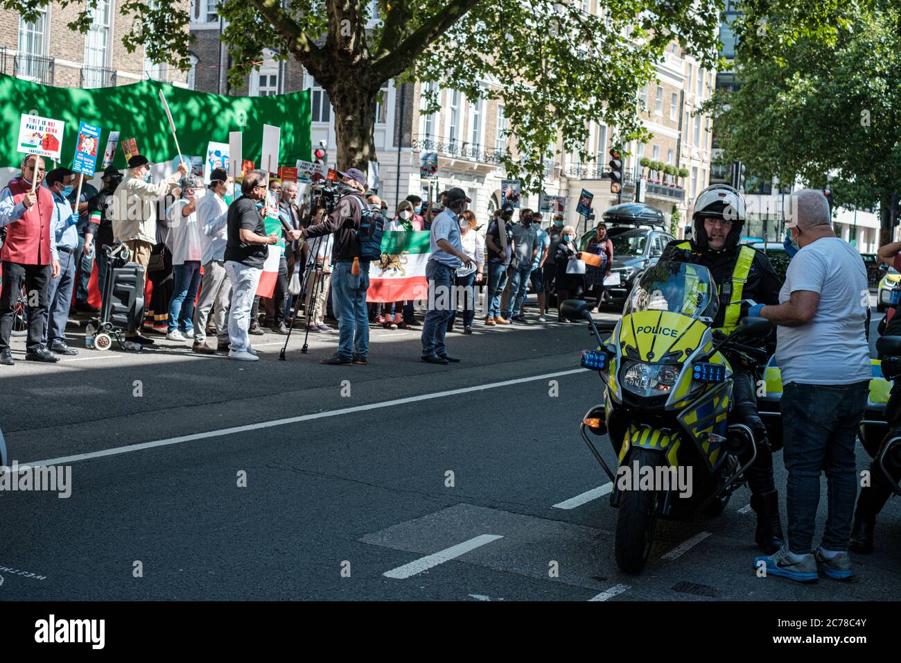 Protesta contro il CCP iraniano, indiano e Hong Konger Foto Stock