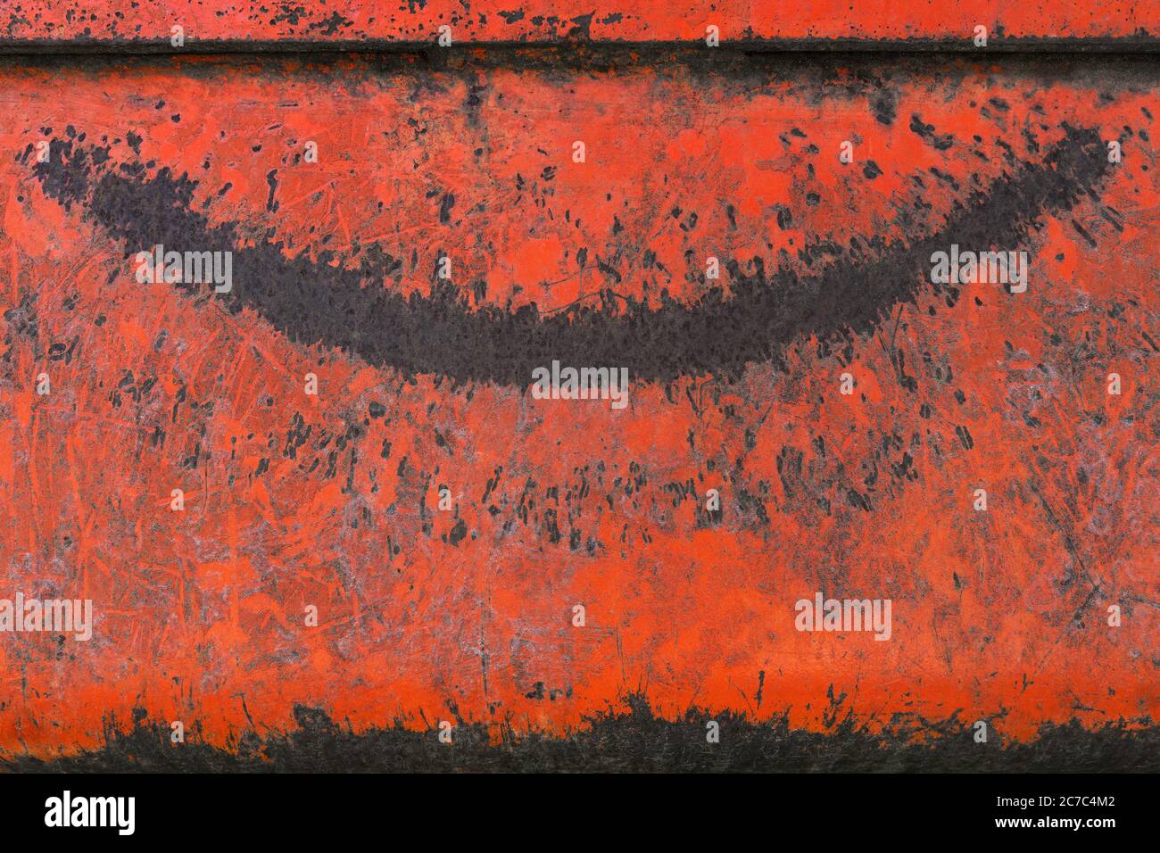 Metallo rosso con un motivo a forma di bocca ridente Foto Stock