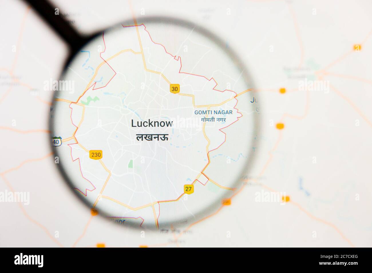 Lucknow, India concetto illustrativo di visualizzazione della città sullo schermo attraverso la lente di ingrandimento Foto Stock