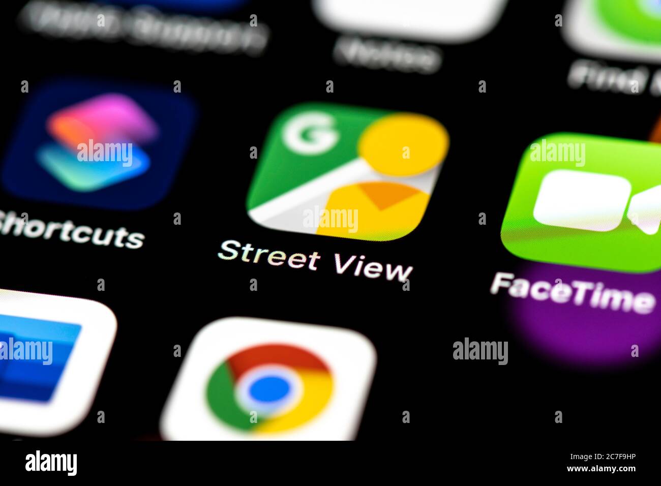 Google Street View, icone delle app sul display di un telefono cellulare, iPhone, smartphone, primo piano Foto Stock