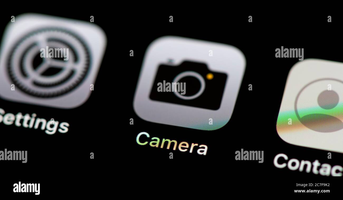 Fotocamera, icona fotocamera, icone app sul display di un telefono cellulare, iPhone, smartphone, primo piano Foto Stock