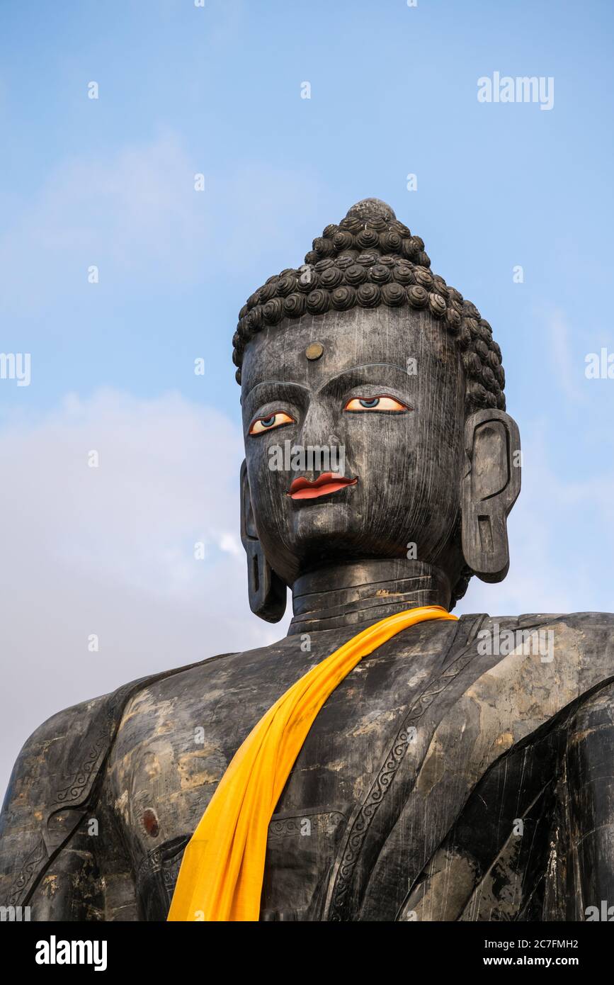 Statua di Buddha al Tempio Muktinath, Mustang inferiore, Nepal Foto Stock