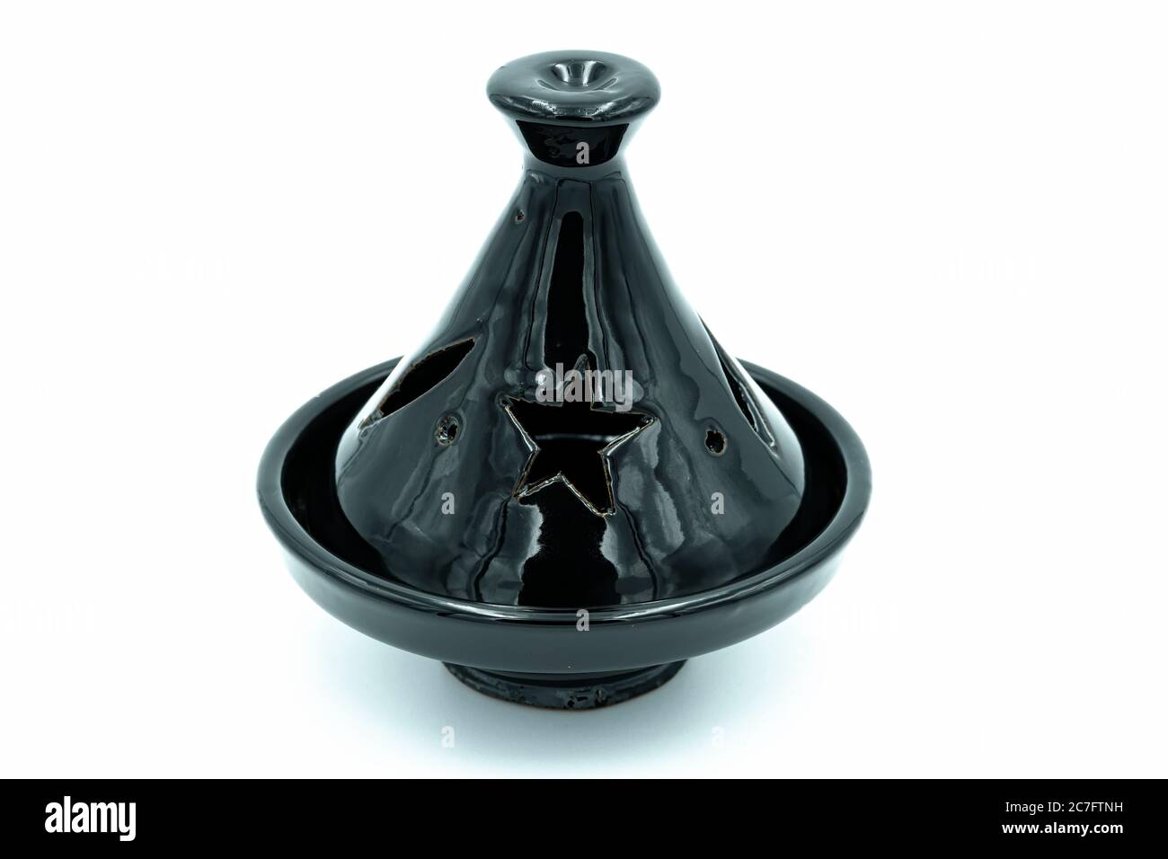 Tajine nero artigianale con aperture di aerazione per candele, ideale per spot su Indiani, Marocchini, ecc. Foto Stock