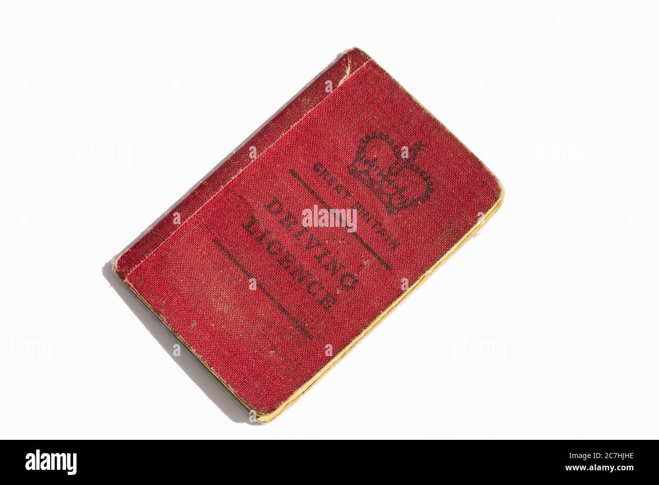 Vecchio libretto rosso della patente di guida del veicolo privato del Regno Unito, sostituito nel 1973 con patente di guida verde. Foto Stock