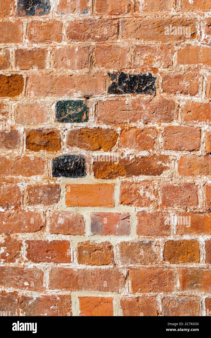 Vecchio muro con mattoni, facciata casa, sfondo Foto Stock