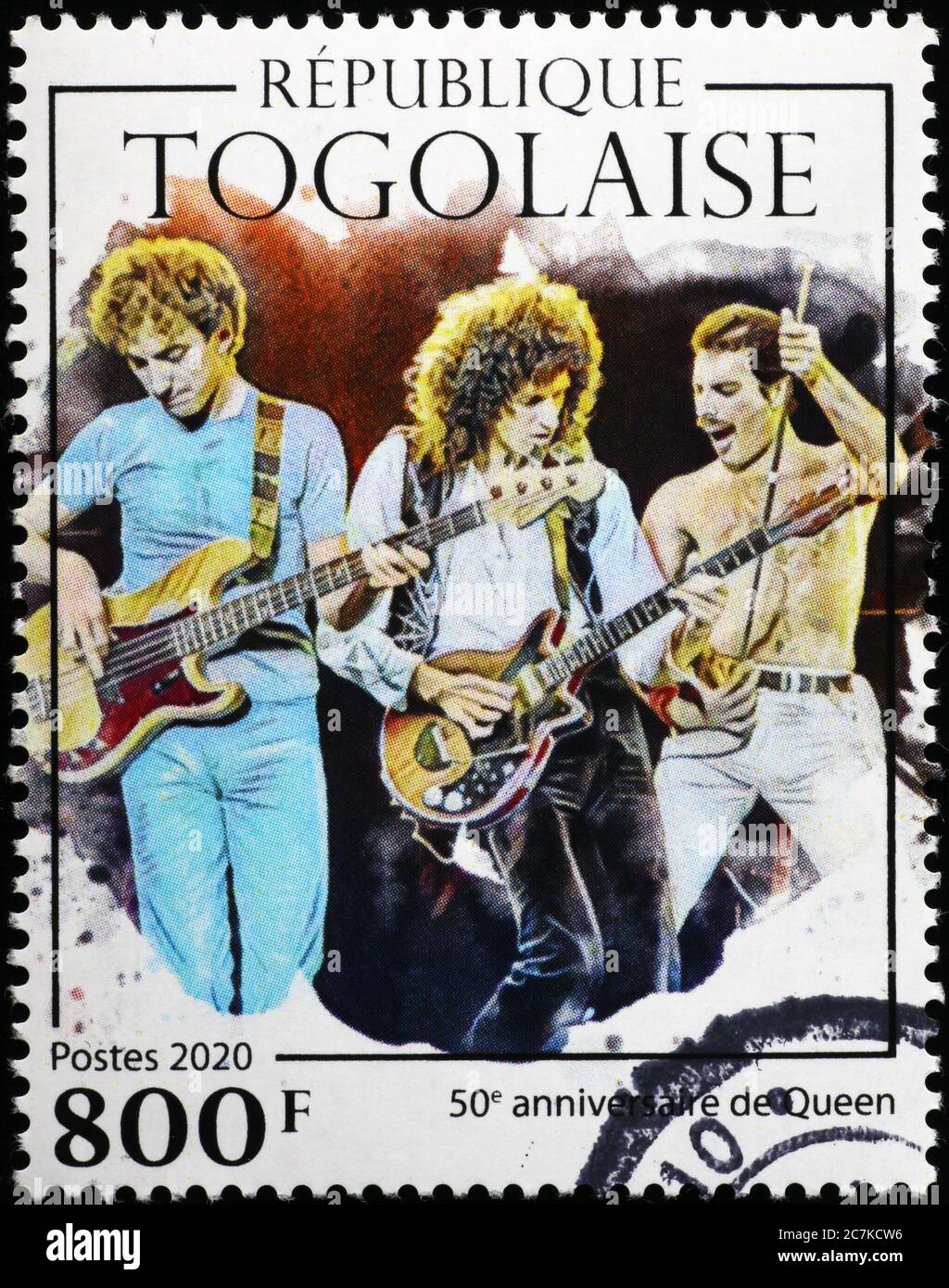 Band la Regina in concerto su un francobollo Foto Stock