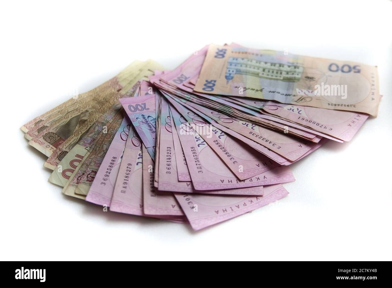 Un sacco di soldi ucraino hryvnia su uno sfondo grigio con Foto Stock