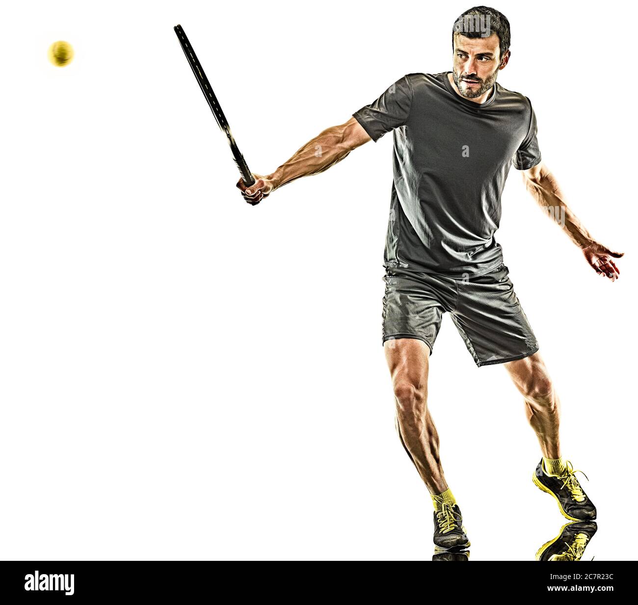 un tennista caucasico maturo uomo a lunghezza intera silhouette a mano in studio isolato su sfondo bianco Foto Stock
