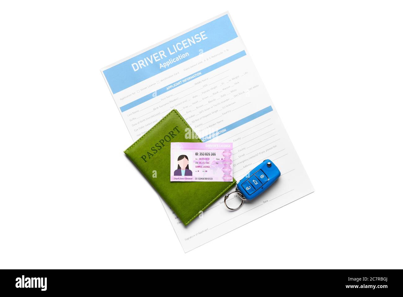 Patente di guida con modulo di richiesta, chiave dell'auto e passaporto su sfondo bianco Foto Stock