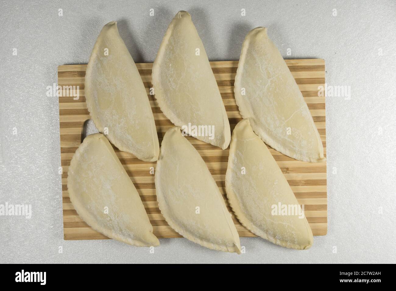 Tagliole surgelate, vareniki su legno di faggio Foto Stock