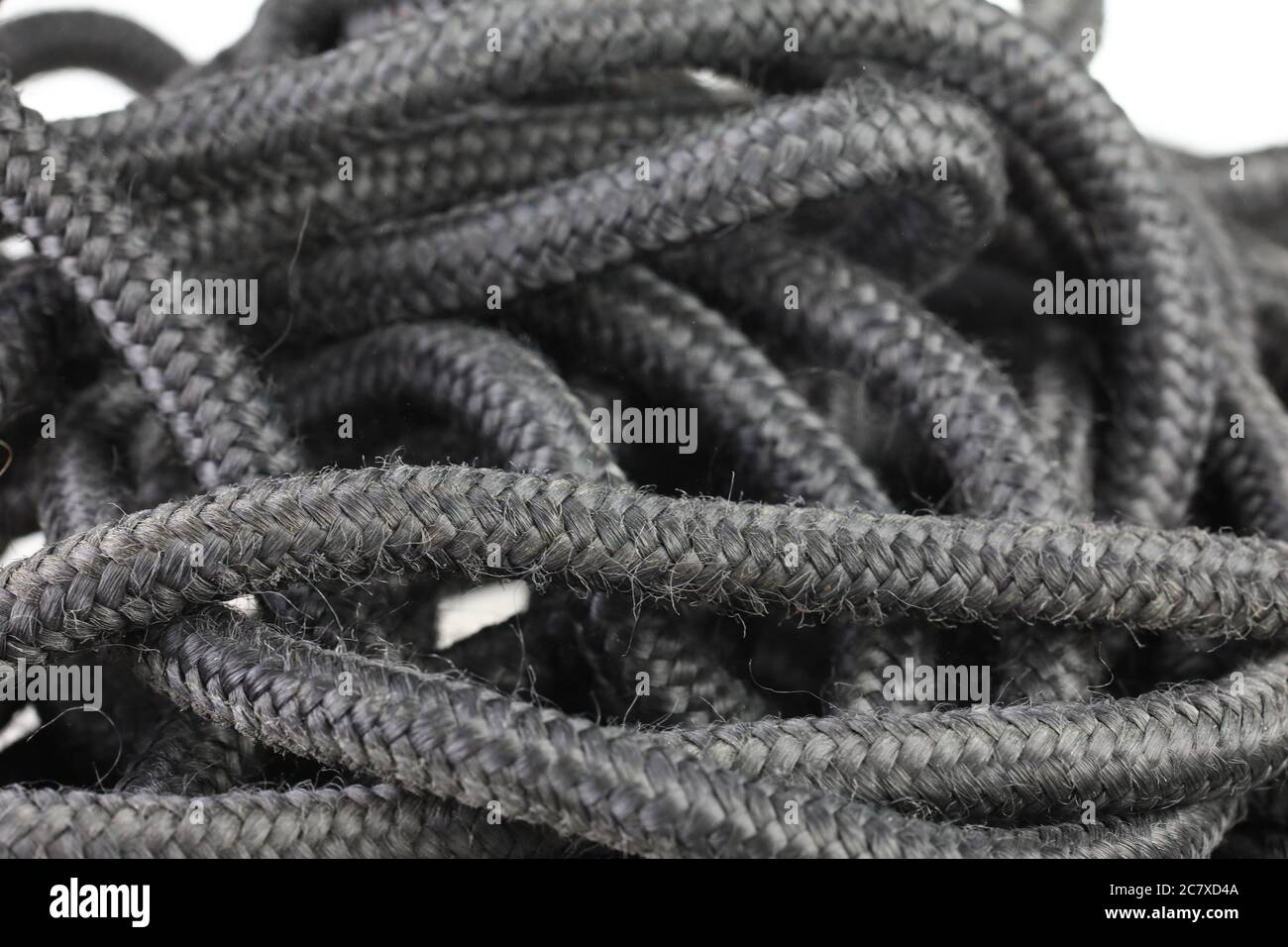 Mucchio di corda di nylon nera Foto Stock