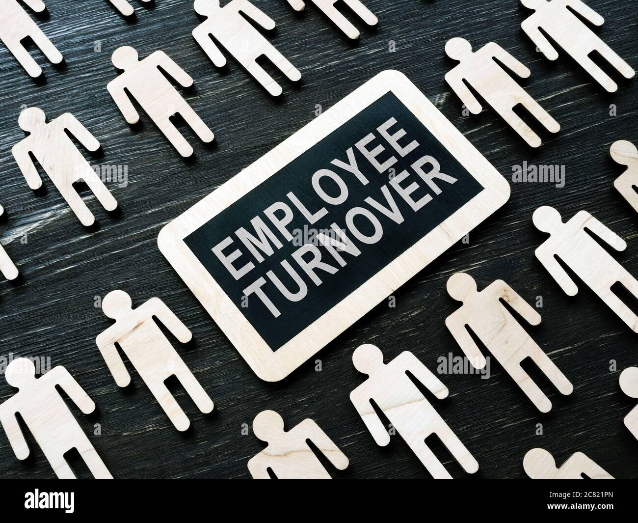 Targa con parole fatturato e cifre dei dipendenti. Foto Stock