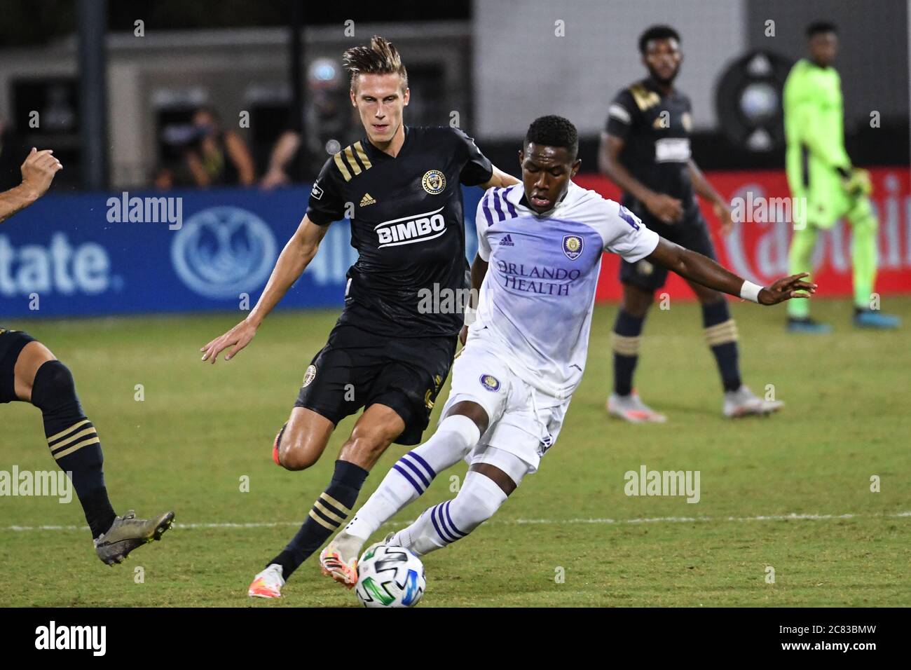 Orlando, Florida, Stati Uniti. 20 luglio 2020. I giocatori di Philadelphia Union e Orlando City lottano per la palla durante il torneo MLS is Back all'ESPN Wild World of Sports di Orlando Florida USA lunedì 20 luglio 2020. Photo Credit: Marty Jean-Louis Credit: Marty Jean-Louis/Alamy Live News Foto Stock