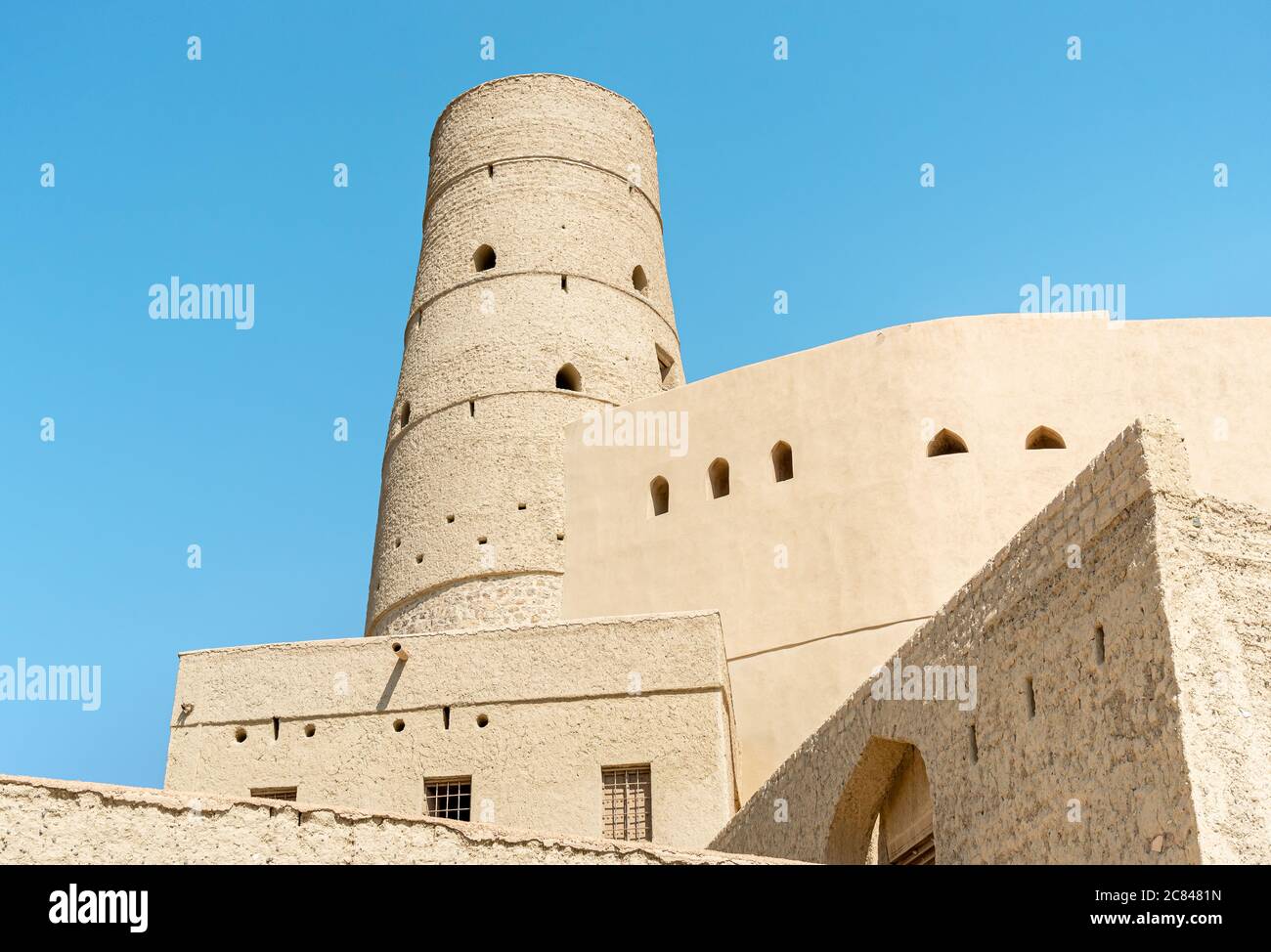 Bahla Fort ai piedi del Djebel Akhdar nel Sultanato di Oman. Sito patrimonio dell'umanità dell'UNESCO. Foto Stock