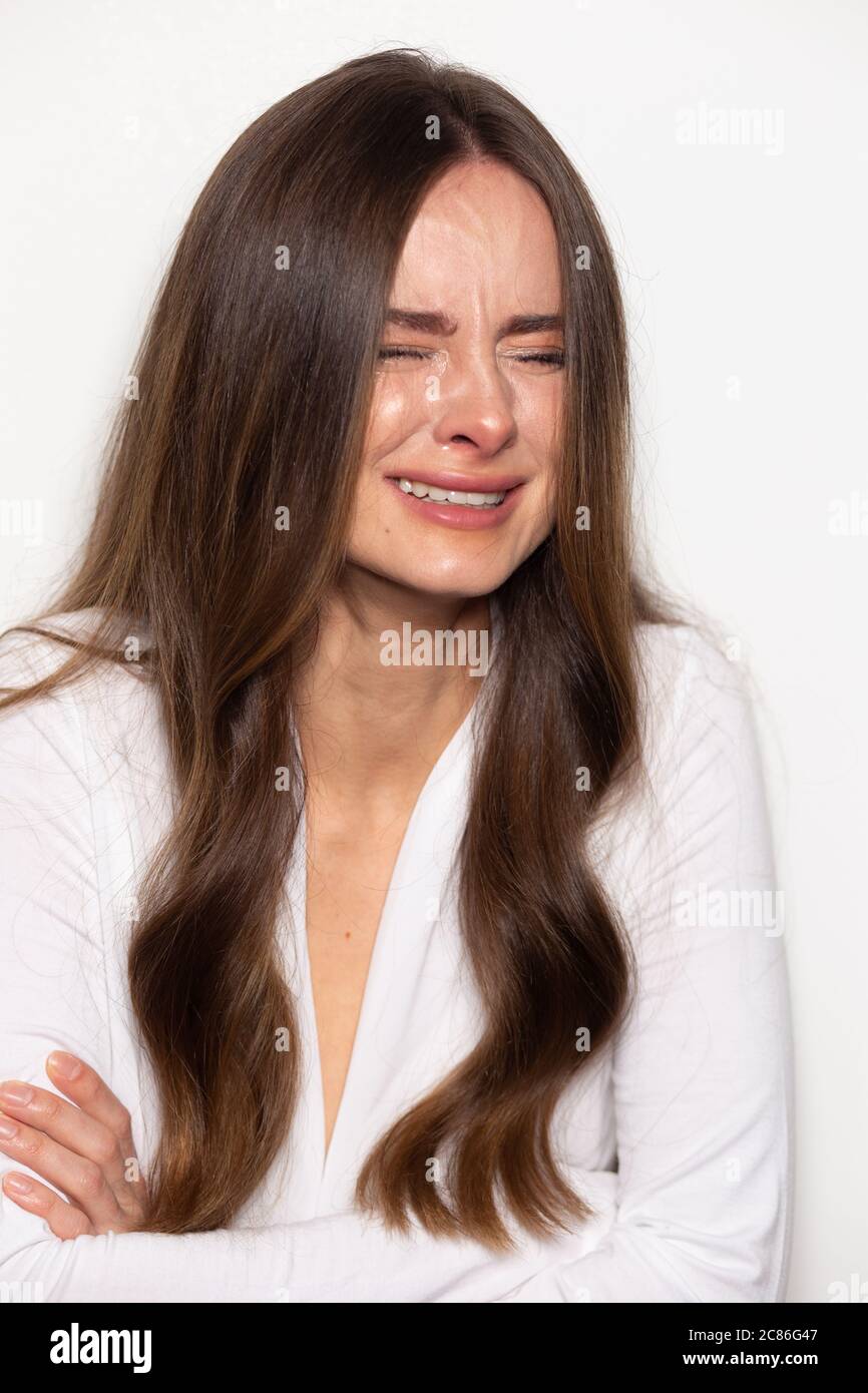 piangendo donna persona piangere vera depressione emozione infelice ragazza bagnata occhi Foto Stock