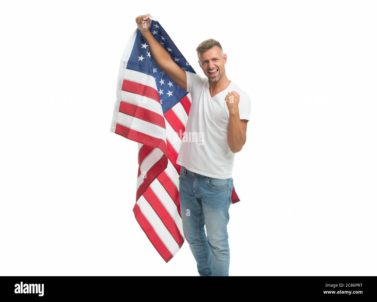 L'uomo maturo americano con la bandiera degli Stati Uniti celebra la festa nazionale, concetto americano di sogno. Foto Stock