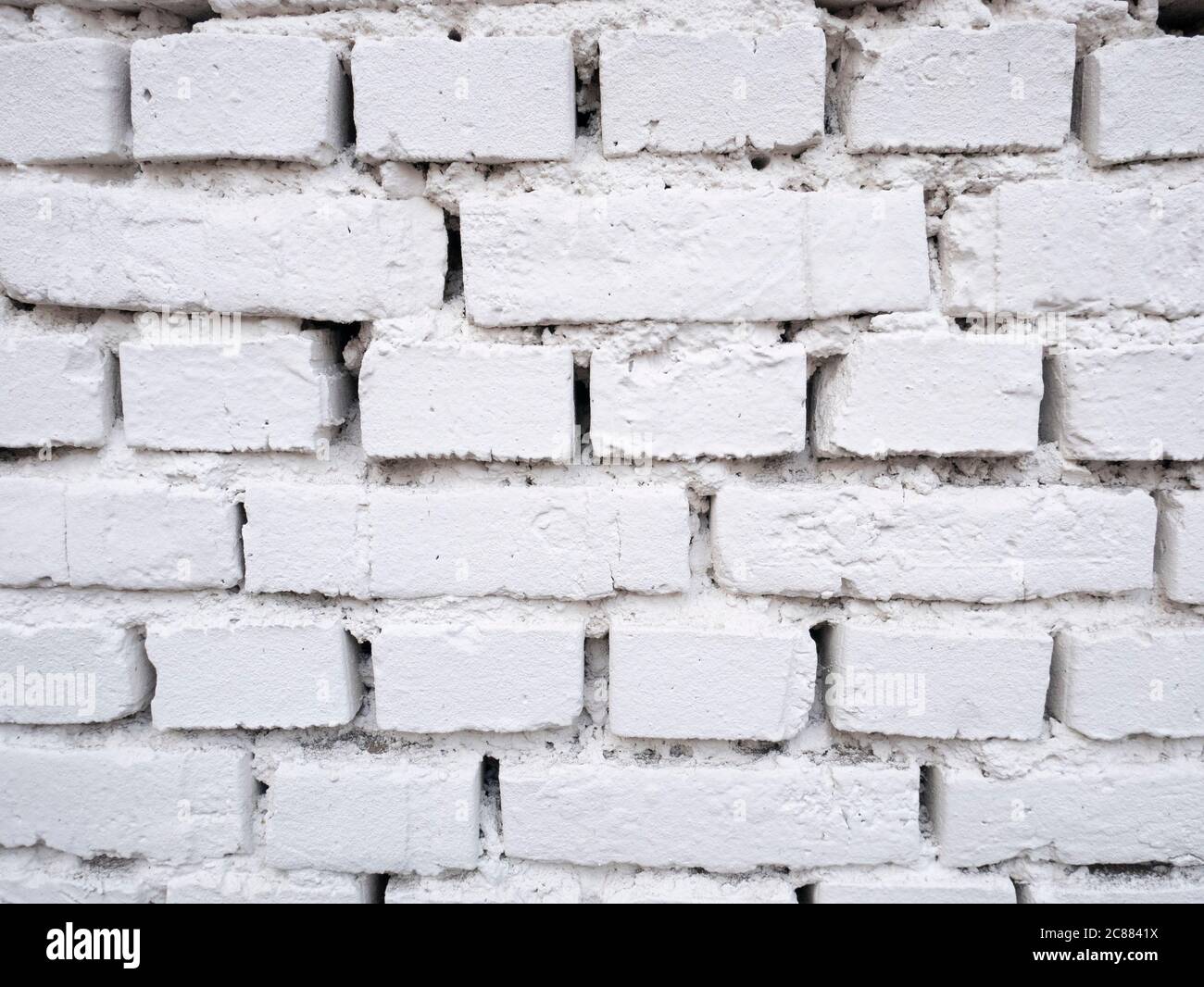 Parete di mattoni bianchi di sfondo design. Foto Stock