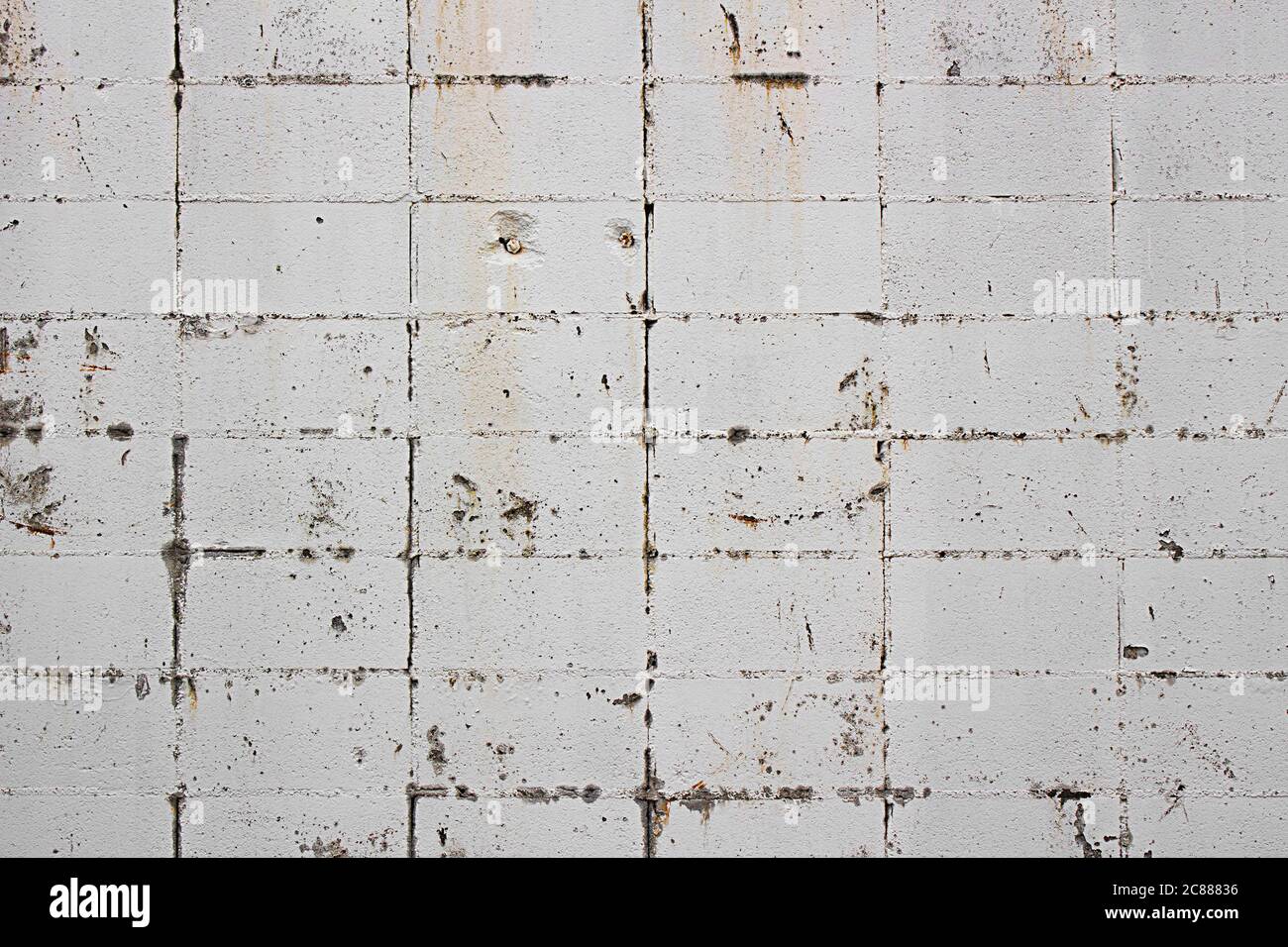 Foto di muro di cemento dipinto di bianco come materiale di sfondo Foto Stock