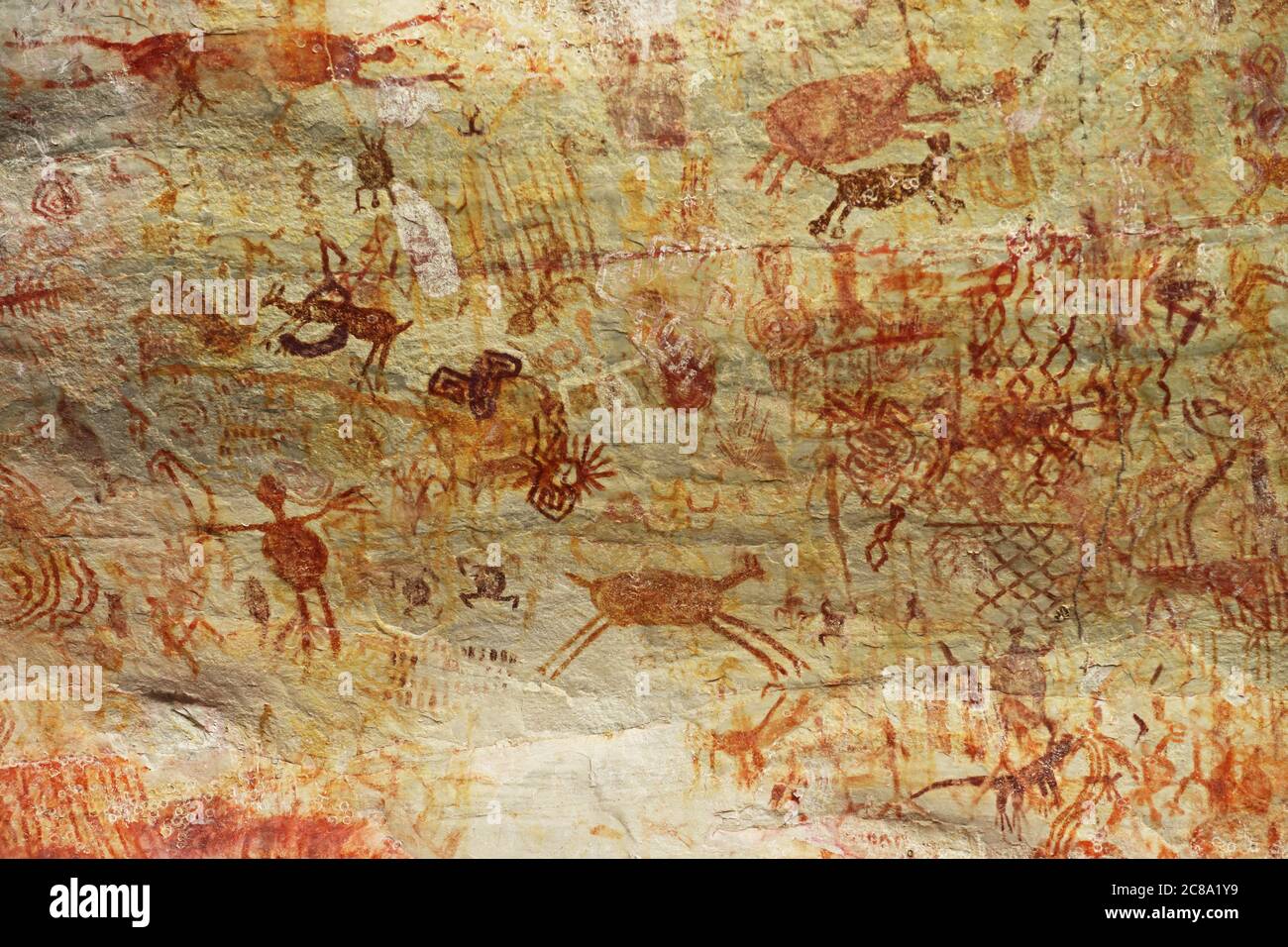 Roccia preistorica arte, dipinti su al riparo scogliera La Lindosa, Colombia Foto Stock