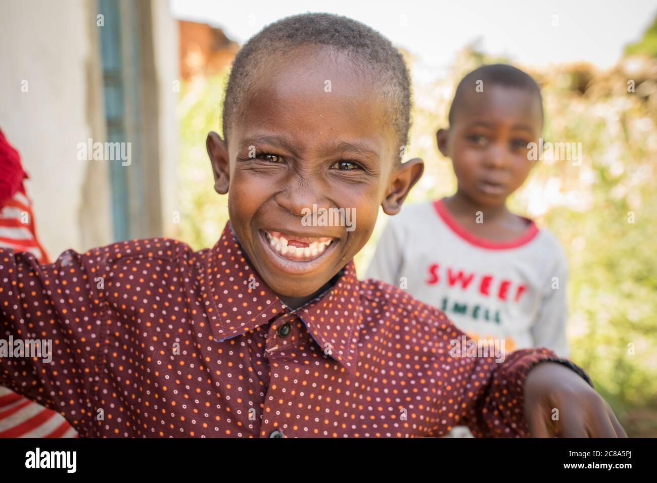 Volti di sorridenti, felici bambini nella contea di Makueni, Kenya. Foto Stock