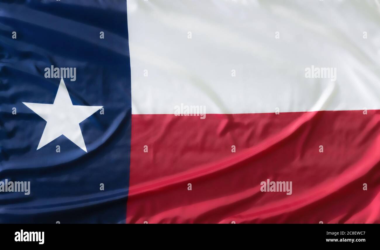 Bandiera di stato del Texas sulla tessitura ondulata del tessuto Foto Stock