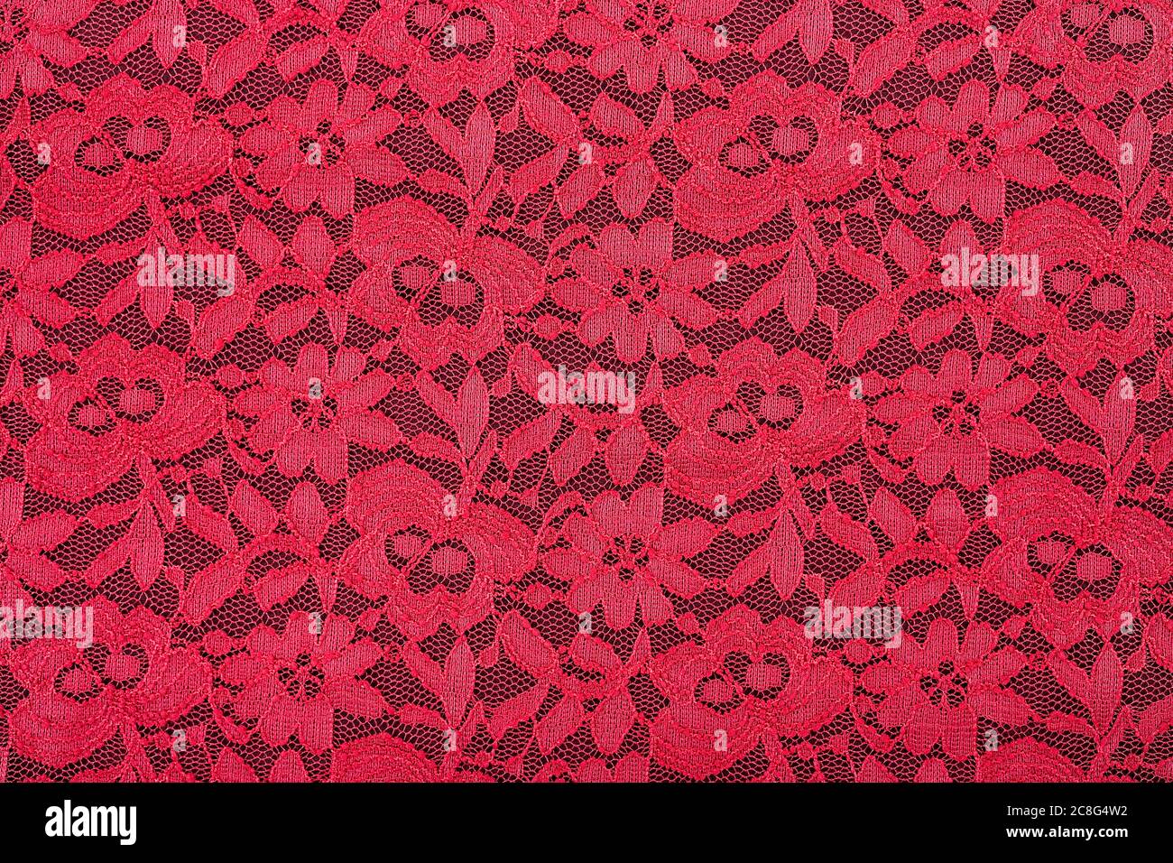 texture in pizzo rosso per l'uso di sfondo, full frame Foto Stock