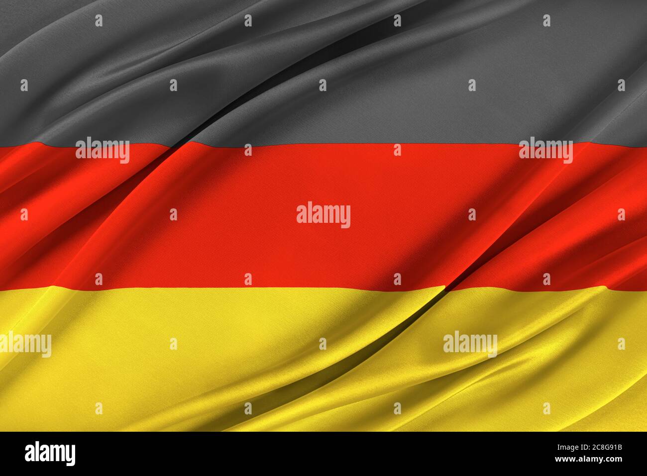 Bandiera tedesca colorata che sventola nel vento. Foto Stock