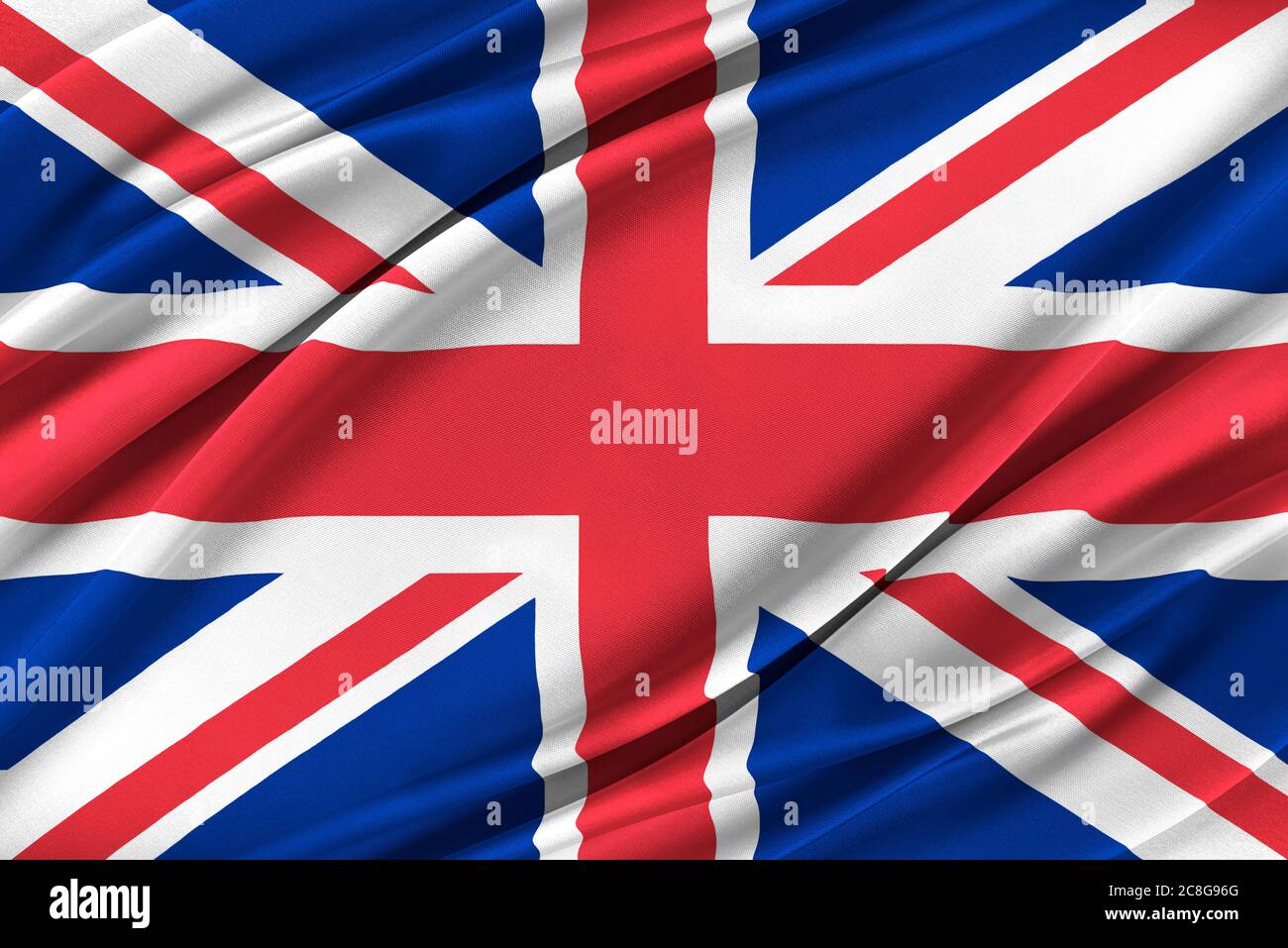 Bandiera britannica colorata che sventola nel vento. Foto Stock