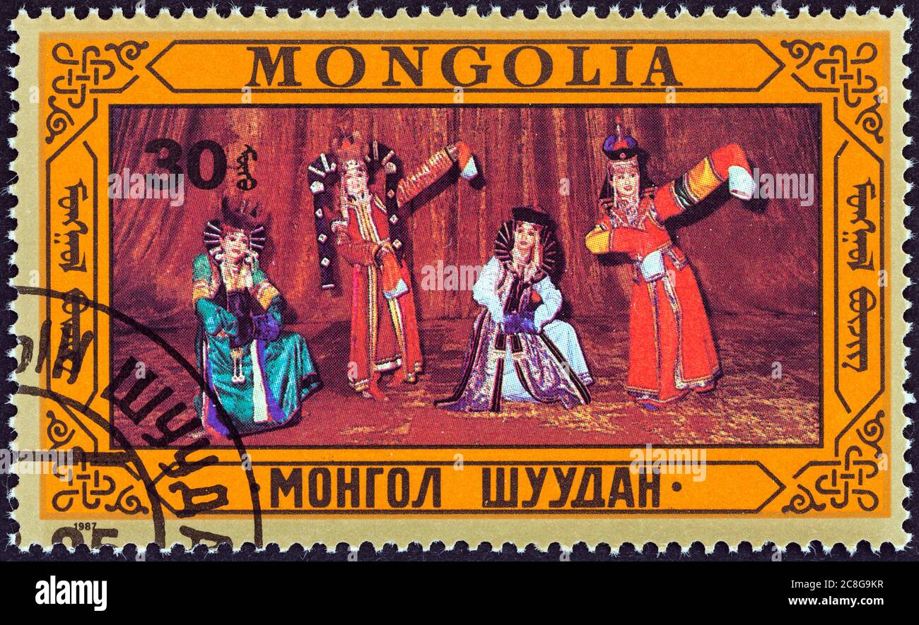 MONGOLIA - CIRCA 1987: Un francobollo stampato in Mongolia mostra danza tradizionale, circa 1987. Foto Stock