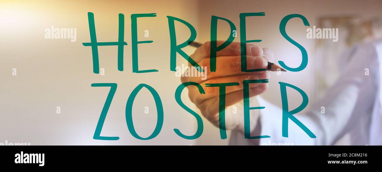 Medico mano che scrive Herper zoster con marcatore. Concetto di assistenza sanitaria Foto Stock