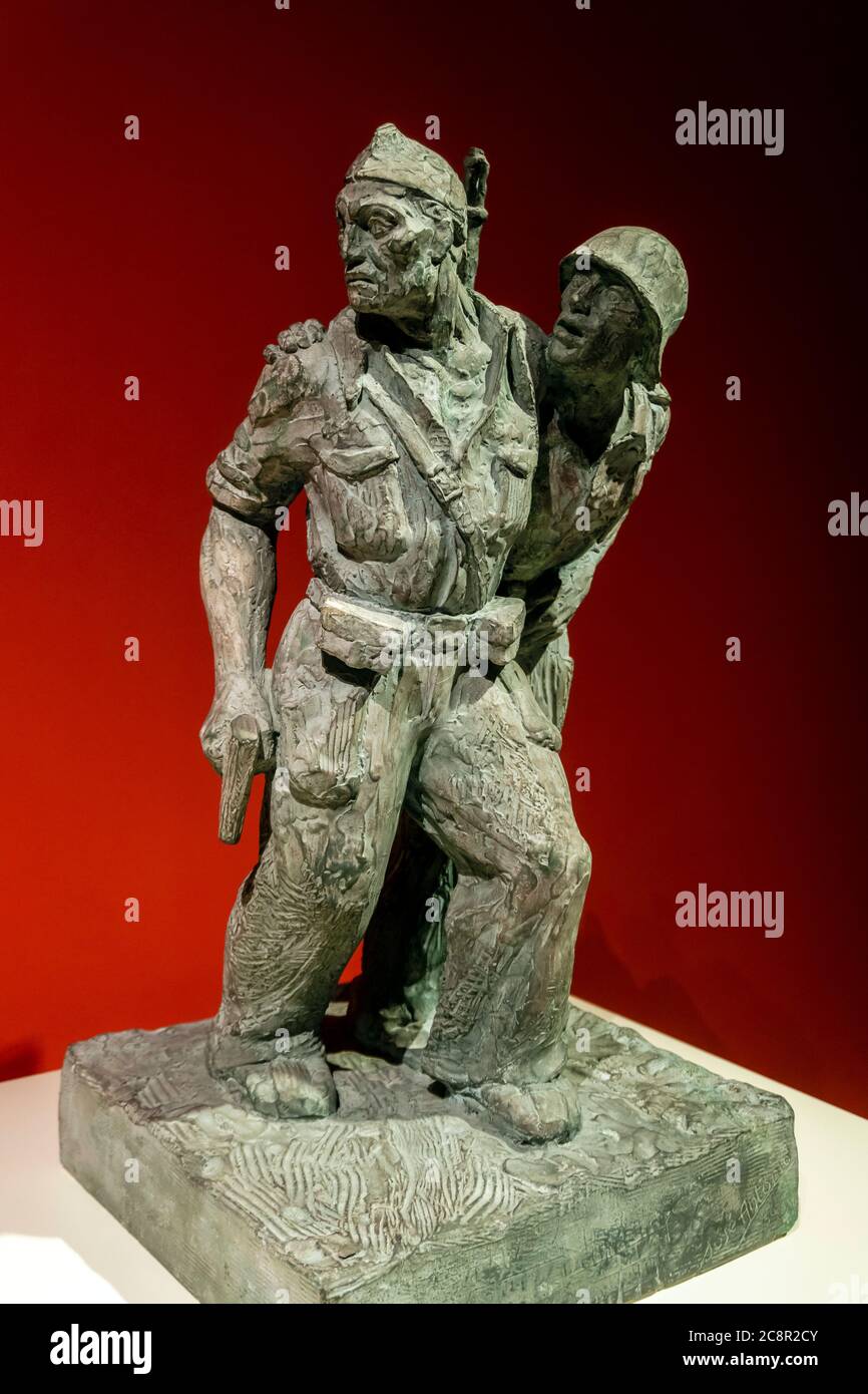 José Antonio scultore, due soldati del fronte popolare (1936), gesso con una patina artificiale del bronce. Foto Stock