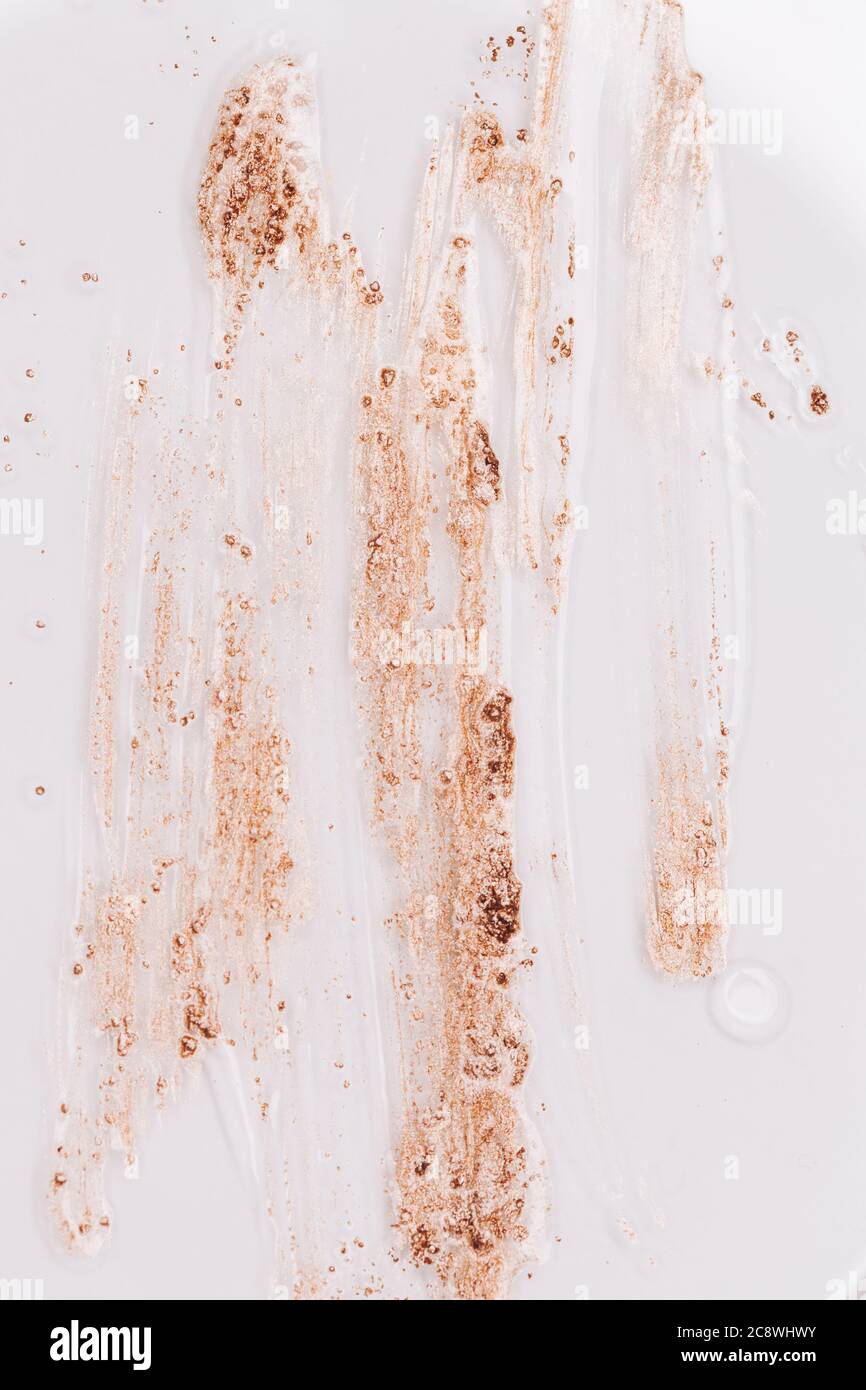 Vernice dorata. Vista dall'alto macro Foto Stock