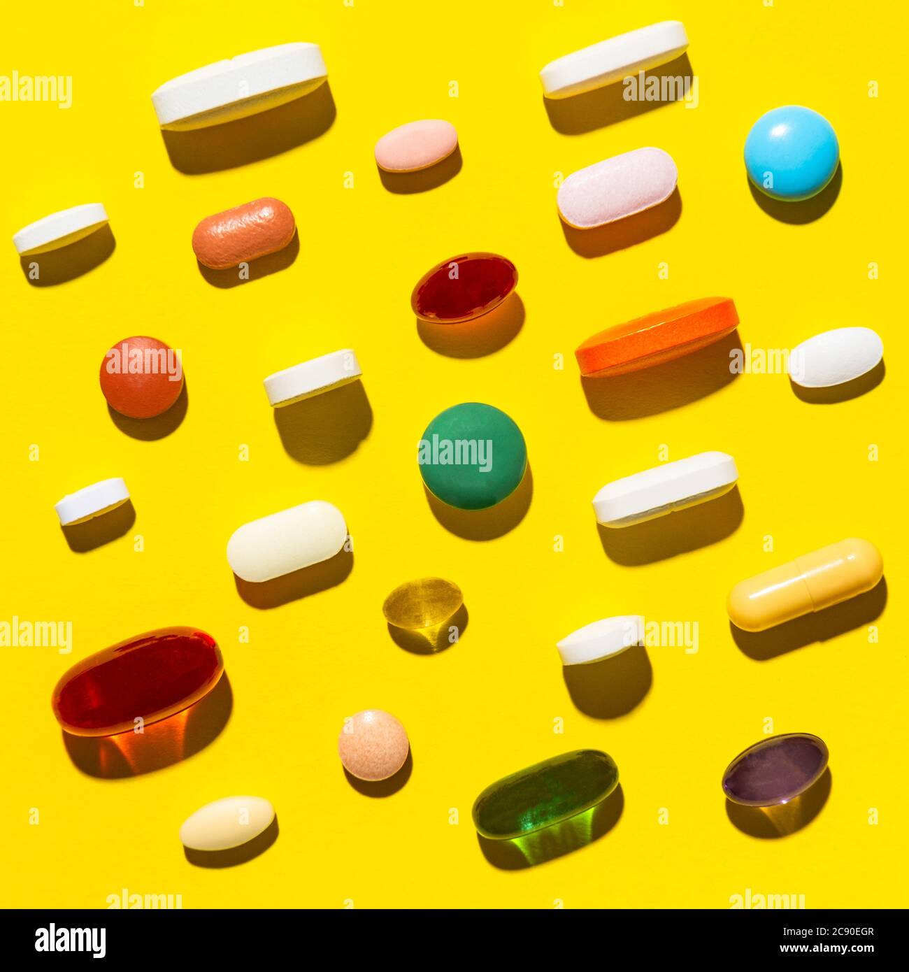 Pillole e capsule di colore giallo Foto Stock