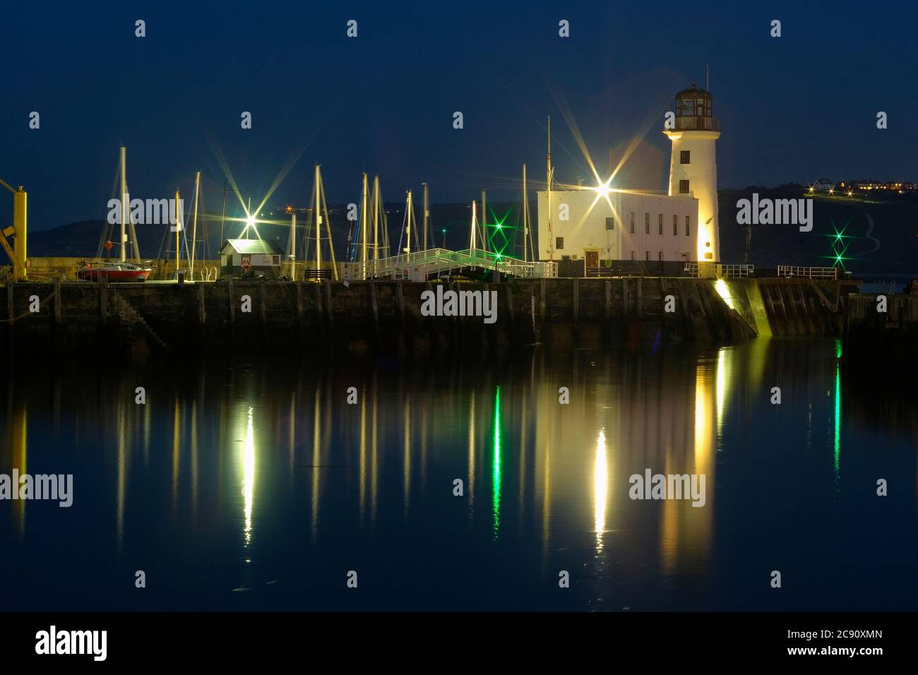 Faro del molo di Scarborough sul molo di Vincent a Scarborough, North Yorkshire Foto Stock