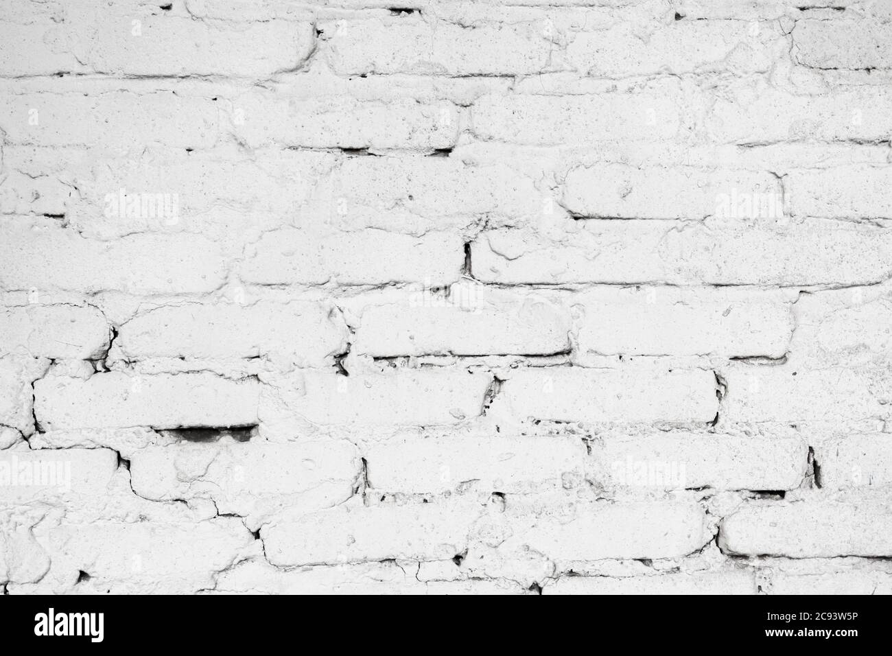 Struttura di parete di cemento e mattoni bianchi. Costruzione sloppy opere astratte sfondo Foto Stock