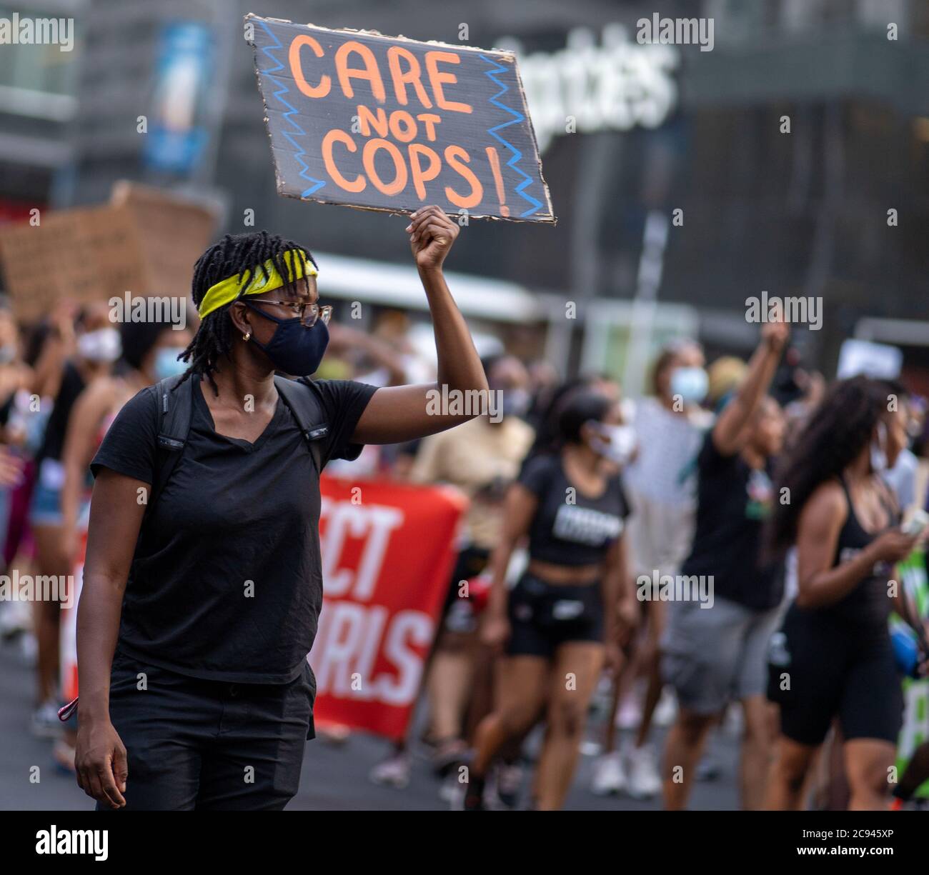 Black Womens/Womxn March Black Lives Matter protesta - Care Not Cops firma a blm marzo Foto Stock