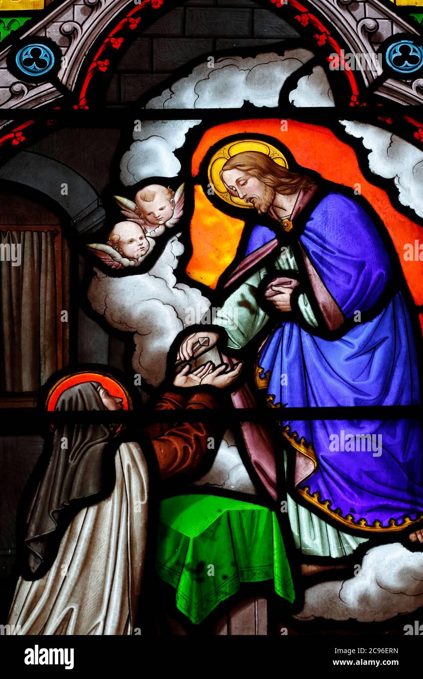 Basilica di nostra Signora di Ginevra. Finestra in vetro colorato. Santa Teresa di Gesù o Teresa di Avila. Ginevra. Svizzera. Foto Stock