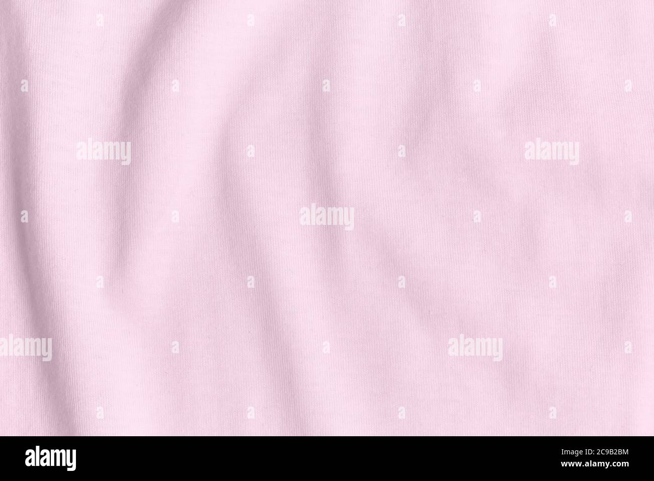 Texture e sfondo di tessuto rosa sminuzzato. Foto Stock