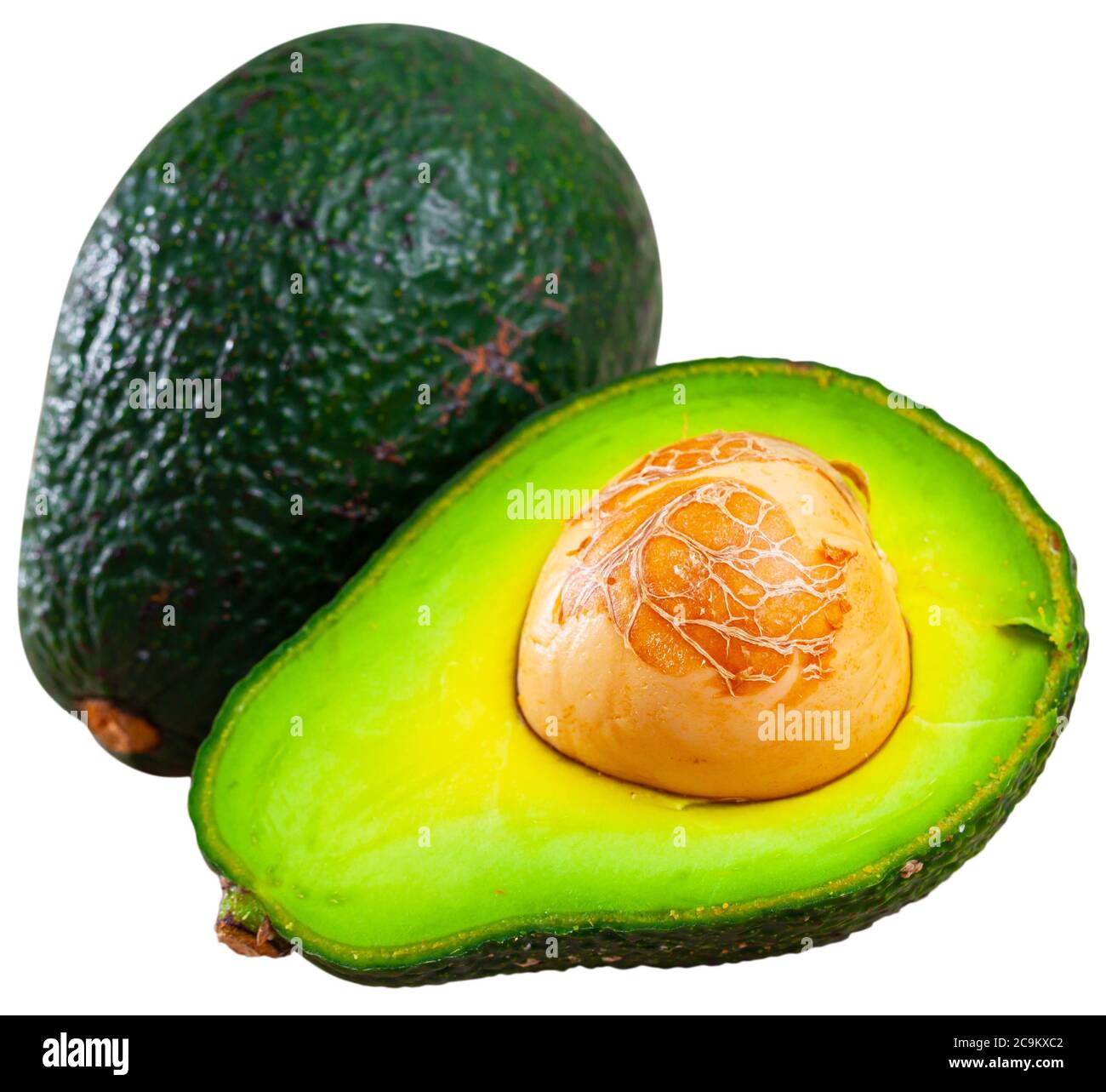 Avocado maturo. Isolato su sfondo bianco Foto Stock