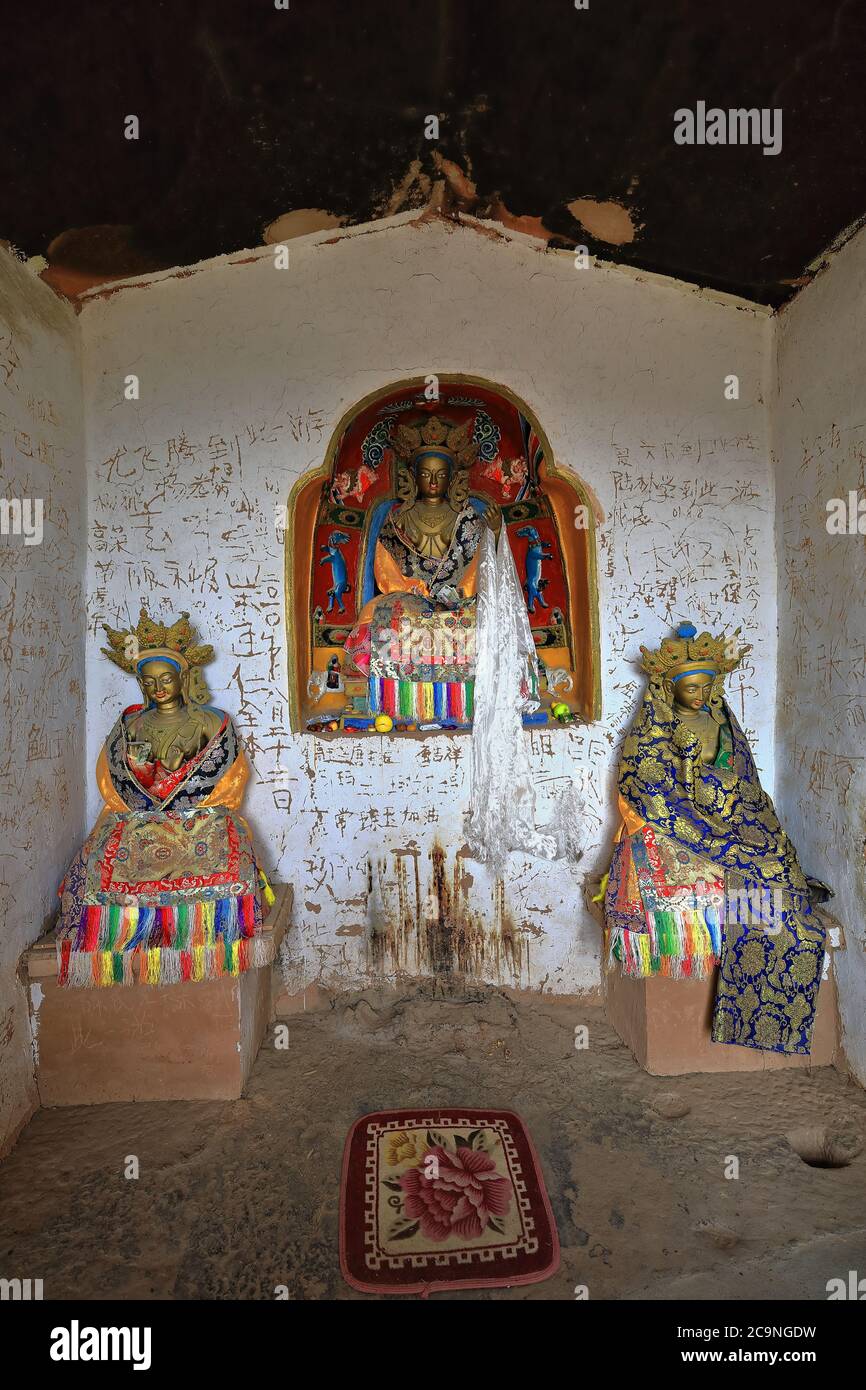 Verde Tara-femmina bodhisattva o Buddha con assistenti Marici-Ekajata-Thirtythree Grotta del Paradiso-MatiSi-Gansu-China-0991 Foto Stock