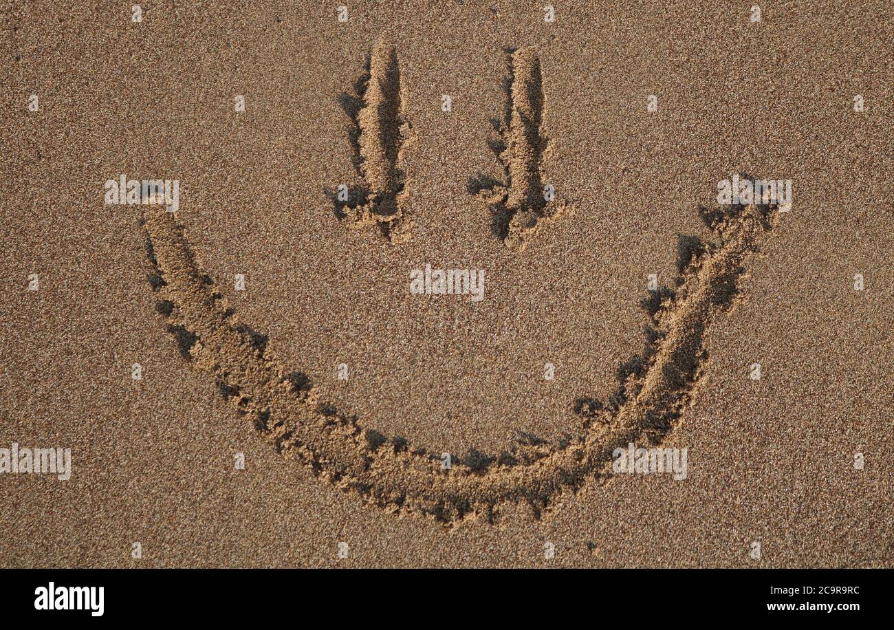 Buon volto scritto nella sabbia, Cipro Foto Stock