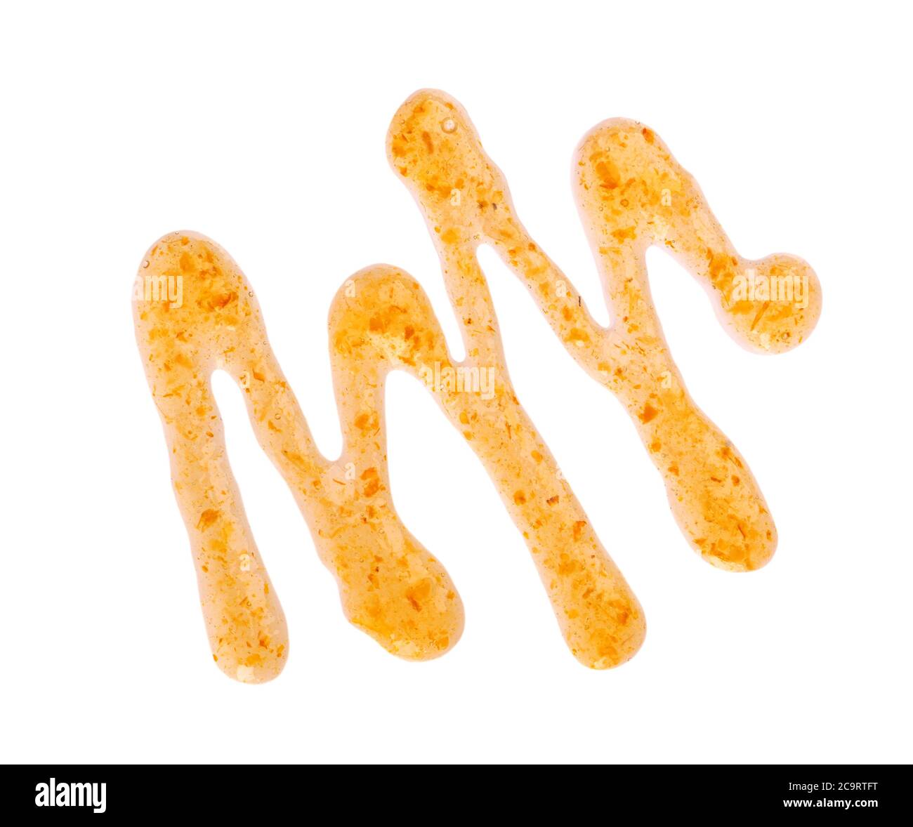 Arancione spessa marmellata di gocce, isolato su sfondo bianco. Marmellata di mandarini, confettura di fibbie marine, gocce di condimento. Vista dall'alto. Foto Stock