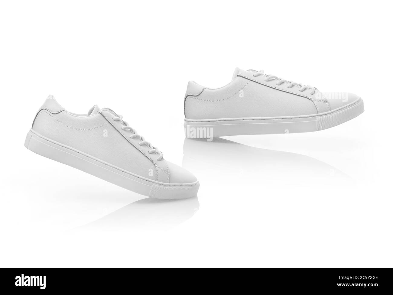 Scarpe bianche isolate su bianco Foto Stock