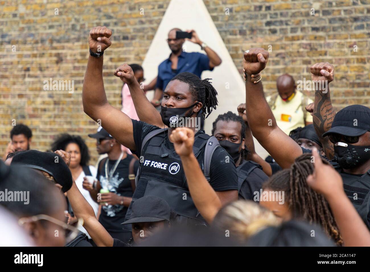 Membri della Famiglia Forever durante il giorno dell'emancipazione di Afrikan marzo, Brixton, Londra, 1 agosto 2020 Foto Stock